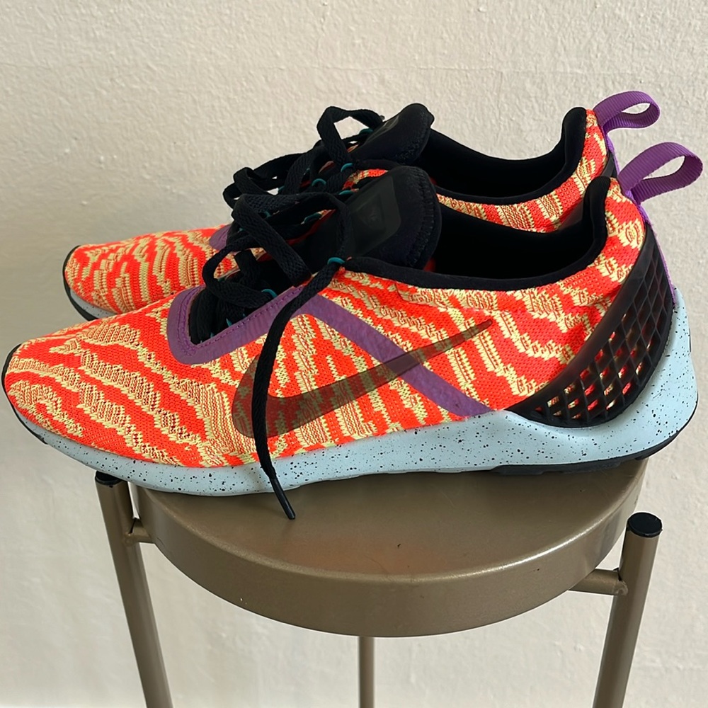 Orange Nike lightweight runners